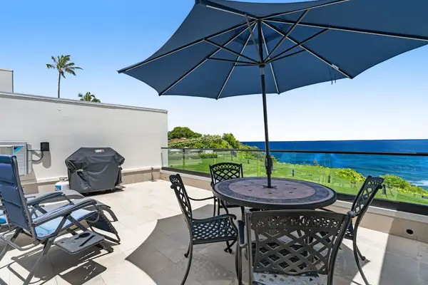Private terrace with outdoor dining, barbecue, and stunning ocean views