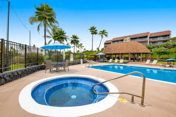 Resort Pool With Relaxing Hot Tub