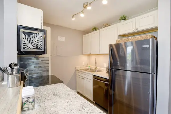 Stylish Kitchen With Stainless Appliances