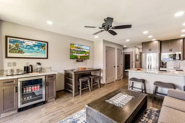 Fully remodeled living room with sofa bed for extra guests and a flat screen tv for your enjoyment.