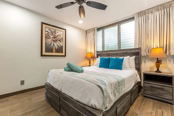 Spacious master bedroom with king bed.