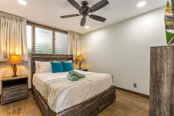 Spacious master bedroom with king bed.