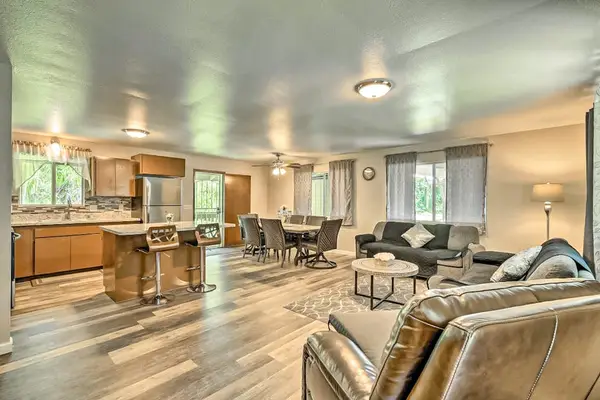 Living room open to the kitchen and dining room so you are never away from family.