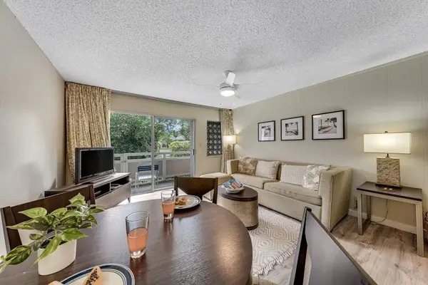 This cozy unit features an open-concept living and dining area with a bright, airy layout. Thoughtfully designed to maximize space, it's the perfect place to relax, enjoy meals, and spend time together after a day of exploring.