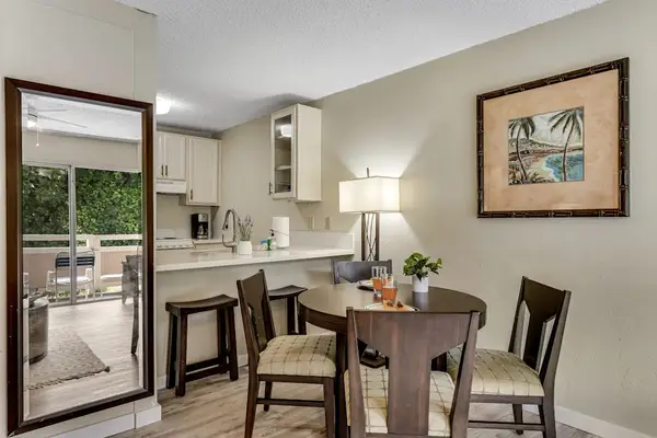 Dining Room with Seating for Four along with extra bar seating from the Kitchen