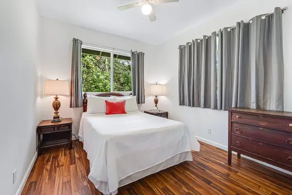 Guest room with queen bed.