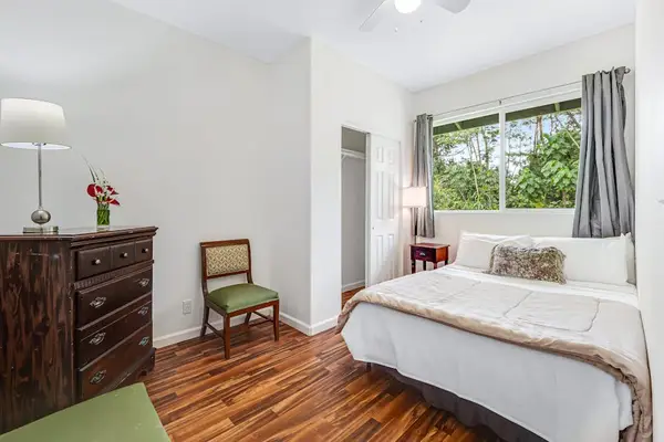 Guest room with queen bed.