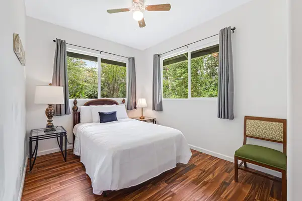 Guest bedroom with queen bed.