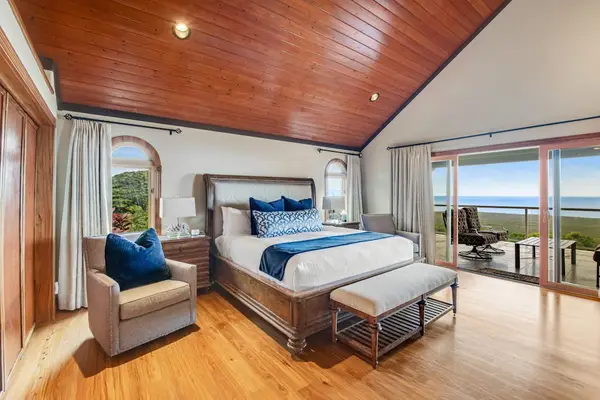 Primary Suite with Vaulted Ceiling, King Bed & Balcony Access