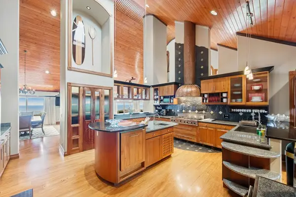 Spacious Chef's Kitchen with Large Island & Premium Finishes