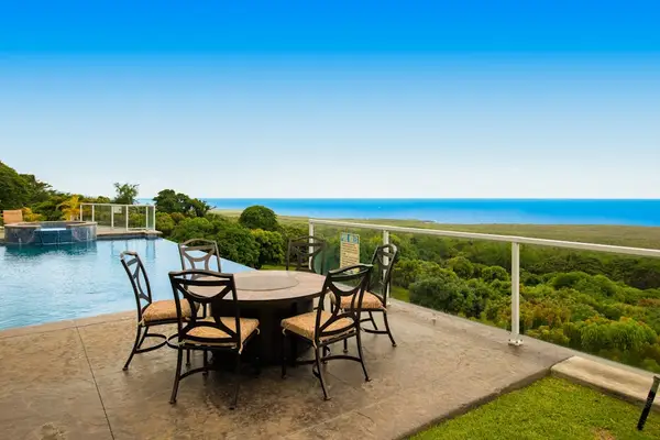 Scenic Outdoor Dining Terrace Overlooking Pool & Ocean