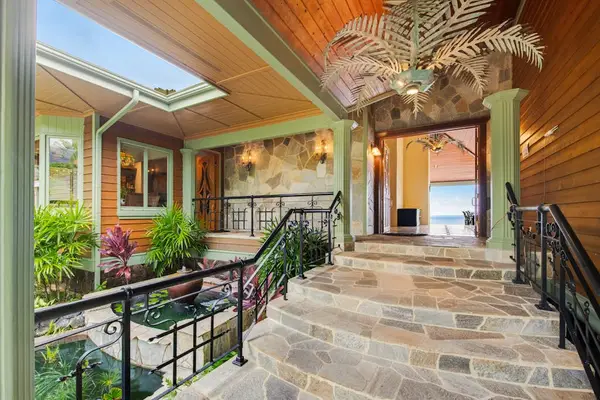 Grand Covered Entrance Steps with Skylight & Tropical Accent Detailing