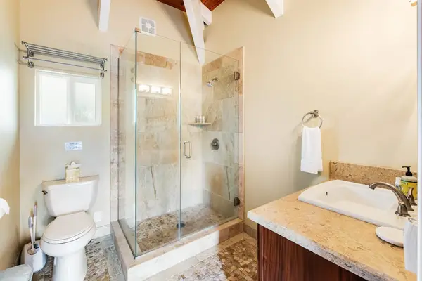 Marble En-Suite Bath with Glass-Enclosed Walk-In Shower
