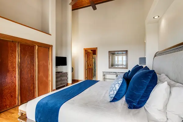 Guest King Suite with Ample Built-In Storage & Wall-Mounted TV