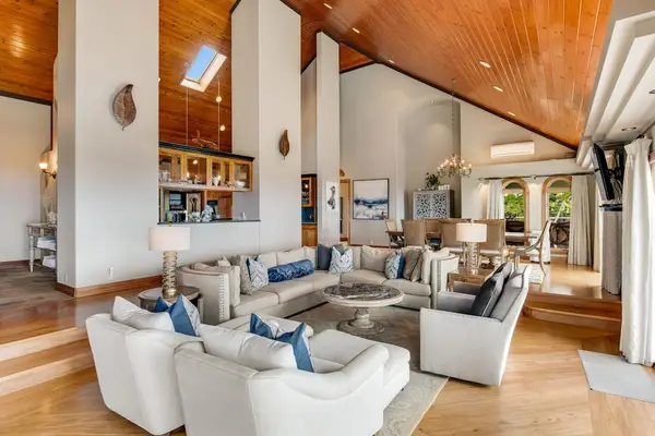 Spacious Open-Concept Living Room with Vaulted Ceilings