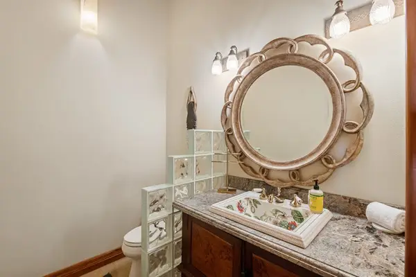 Half Bath Vanity with Ornate Mirror & Storage