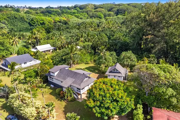 Bird’s-eye view showcasing the beautiful home and its peaceful surroundings