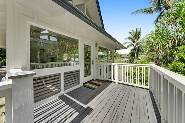 Charming home exterior welcomes you to your memorable coastal getaway