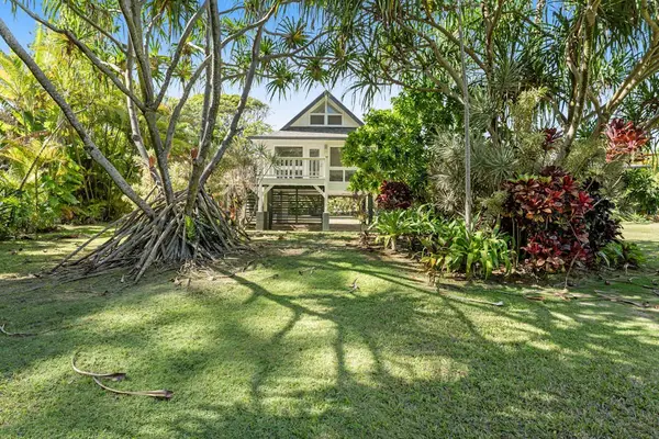 Tropical greenery surrounds a serene retreat made for lingering view