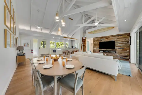 Dining area overlooks a welcoming living room.