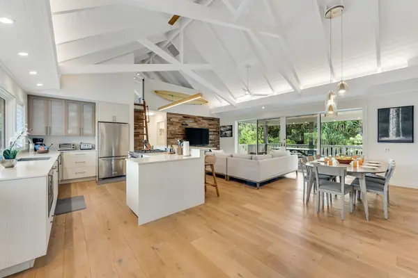 Open-concept kitchen, living, and dining area offers shared gathering space