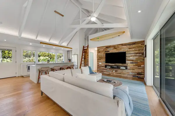 Calm colors and natural textures invite unhurried island mornings