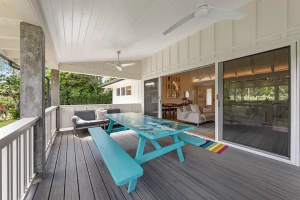 Enjoy outdoor meals and refreshing breezes from the inviting balcony