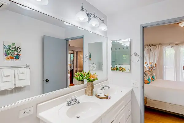 Spotless bathroom provides everything needed for refreshing starts and relaxing evenings together