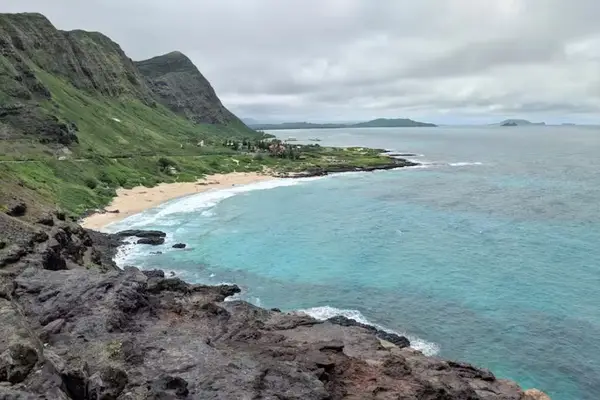 Explore scenic shores framed by lush mountain scenery