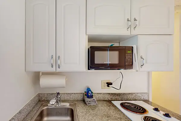 Compact kitchenette with convenient cooking essentials