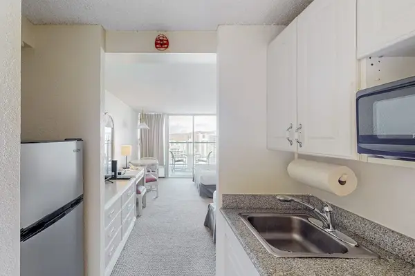 Convenient kitchenette equipped for light cooking and quick meals