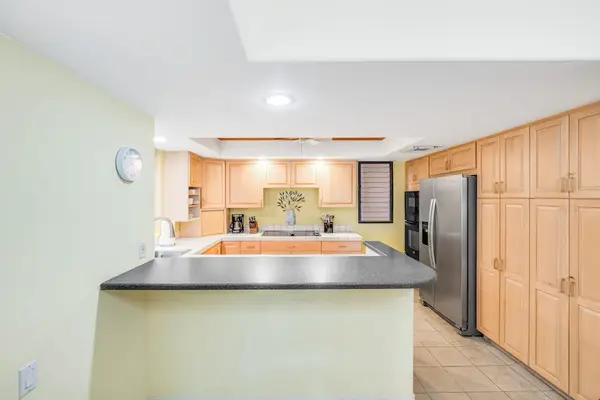 Spacious Kitchen With Breakfast Bar