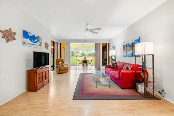 Bright Open Living Room With Lanai Access