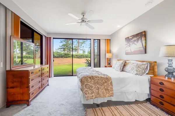 Spacious Bedroom Overlooking Lush Greenery