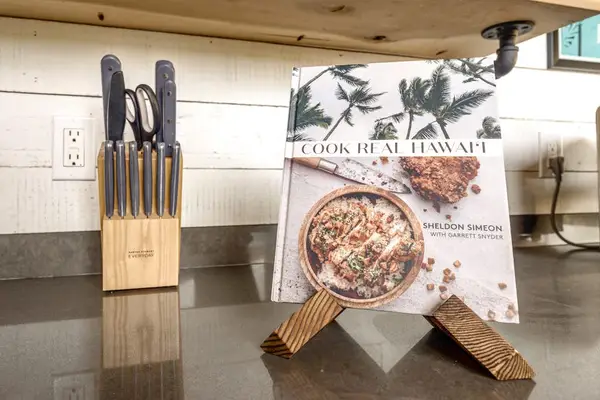 Coffee station and knives make meal preparation effortless and inviting