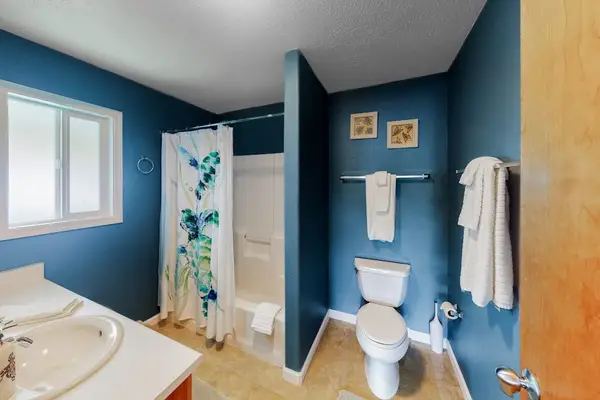 Bright Bathroom With Walk-In Shower