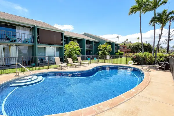 Sparkling community pool with lounge deck