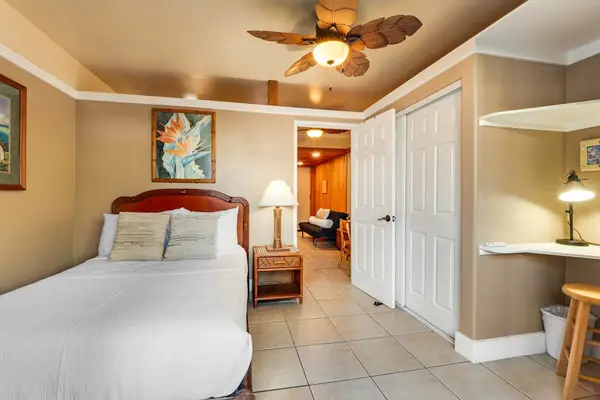 Master bedroom with queen bed, ceiling fan and great views out of your private lanai.