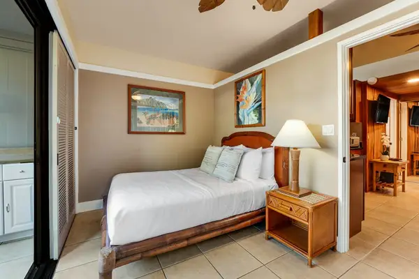 Master bedroom with queen bed, ceiling fan and great views out of your private lanai.
