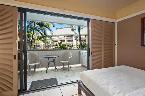 Master bedroom with queen bed, ceiling fan and great views out of your private lanai.