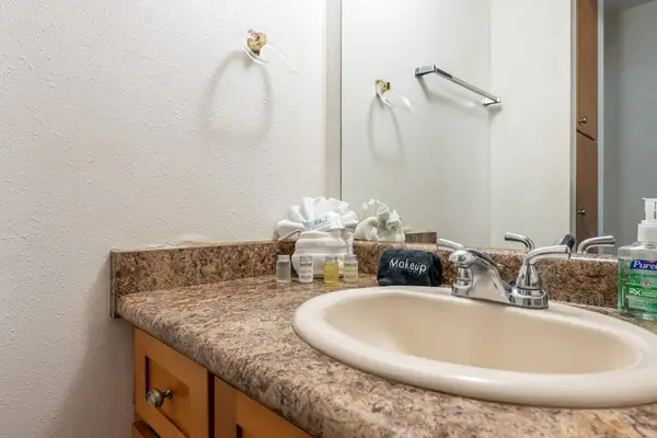Bright Bathroom With Granite Countertops