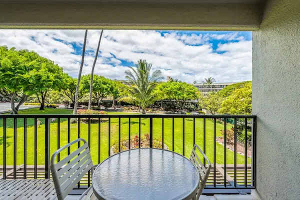 Balcony Framed By Tropical Greenery