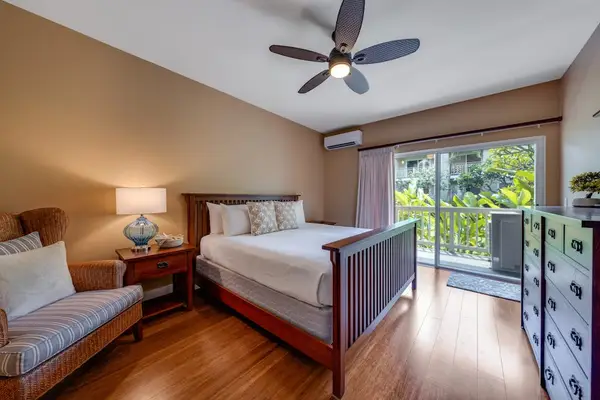 Peaceful primary bedroom with private lanai access