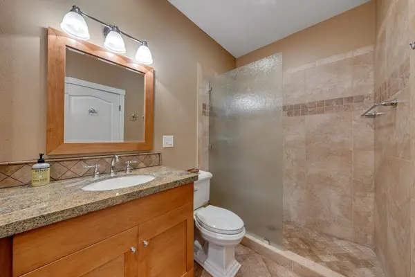 Modern guest bathroom with a large vanity