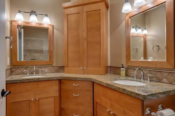 Ensuite bathroom with dual vanities for added convenience