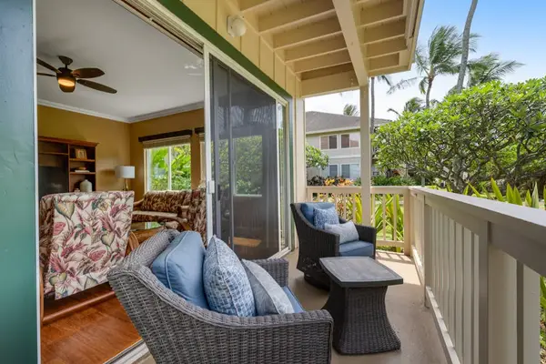 Private lanai surrounded by lush tropical greenery