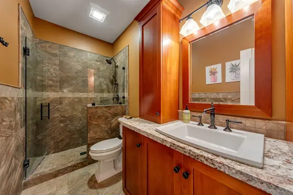 Guest bathroom with a spacious walk-in shower