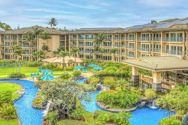 Waipouli Beach Resort's winding lazy river offers a relaxing tropical escape, complete with lush landscaping, waterfalls, and resort-style fun for all ages.