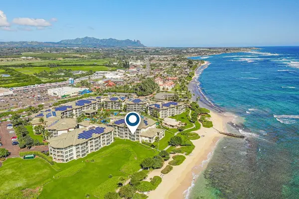 Aerial view of Waipouli Beach Resort, highlighting the location of your home away from home within this beautiful oceanfront property.