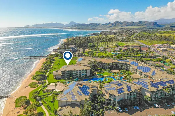 Aerial view of Waipouli Beach Resort that shows the location of your island getaway. Just steps away from the sand and water.